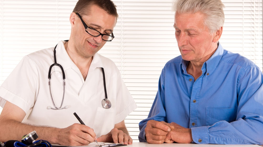 nurse and elderly man