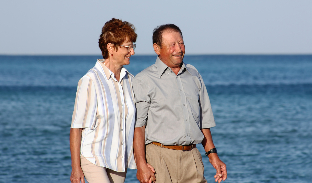 elderly couple walking