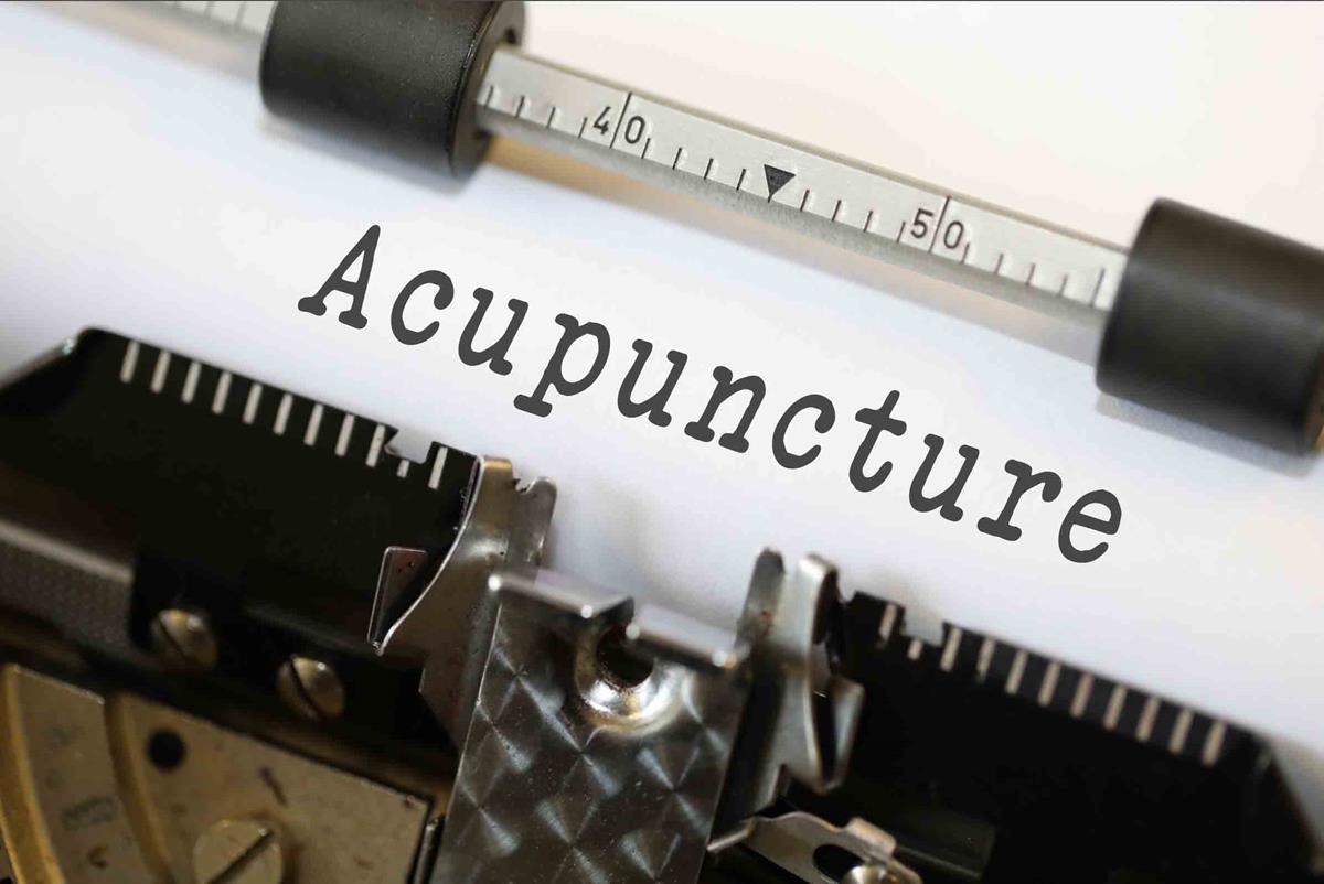 Acupuncture spelt out on typewriter