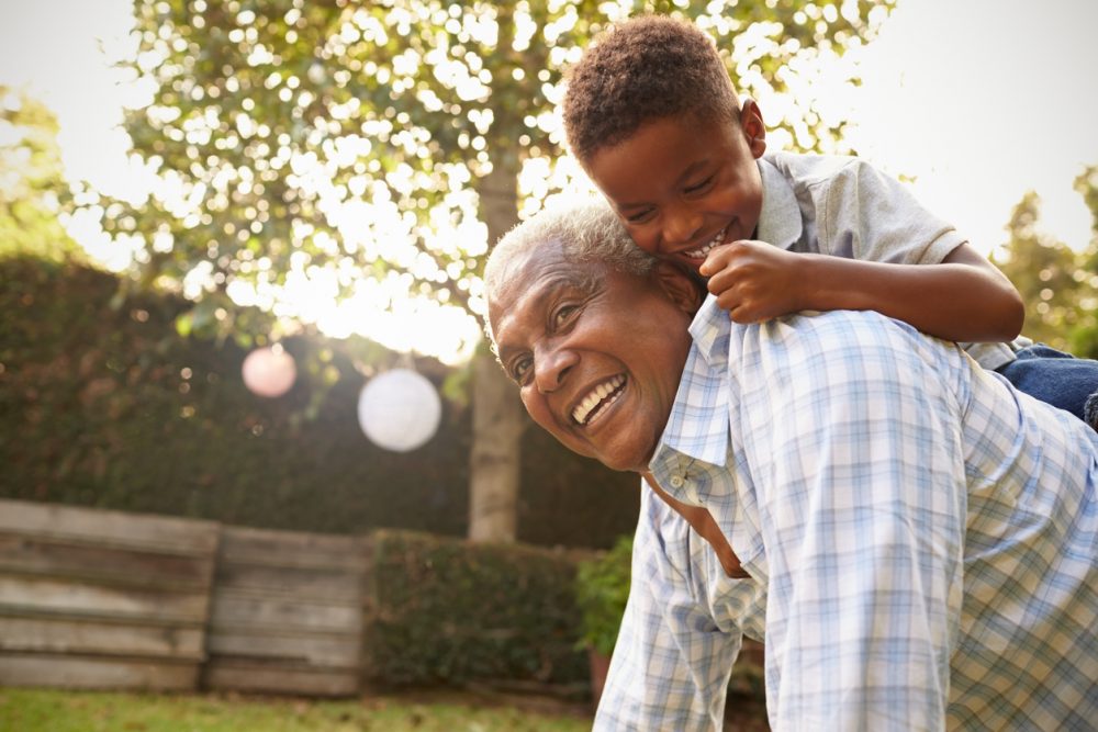 Grandpa playing with grandson